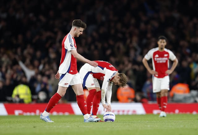 Soccer Football - Premier League - Arsenal v Crystal Palace - Emirates Stadium, London, Britain - April 23, 2025 Arsenal's Declan Rice and Martin Odegaard look dejected after Crystal Palace's Jean-Philippe Mateta scores their second goal Action Images via Reuters/Peter Cziborra EDITORIAL USE ONLY. NO USE WITH UNAUTHORIZED AUDIO, VIDEO, DATA, FIXTURE LISTS, CLUB/LEAGUE LOGOS OR 'LIVE' SERVICES. ONLINE IN-MATCH USE LIMITED TO 120 IMAGES, NO VIDEO EMULATION. NO USE IN BETTING, GAMES OR SINGLE CLUB/LEAGUE/PLAYER PUBLICATIONS. PLEASE CONTACT YOUR ACCOUNT REPRESENTATIVE FOR FURTHER DETAILS..