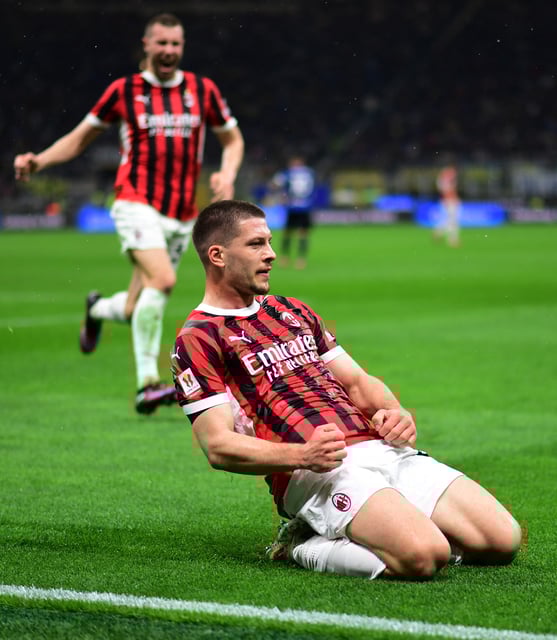 Soccer Football - Coppa Italia - Semi Final - Second Leg - Inter Milan v AC Milan - San Siro, Milan, Italy - April 23, 2025 AC Milan's Luka Jovic celebrates scoring their first goal REUTERS/Daniele Mascolo