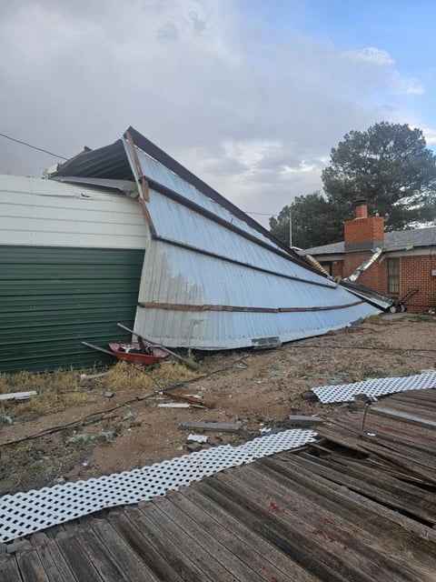 A metal roof was blown off and landed in a neighbor’s yard during storms in Midland on Tuesday.