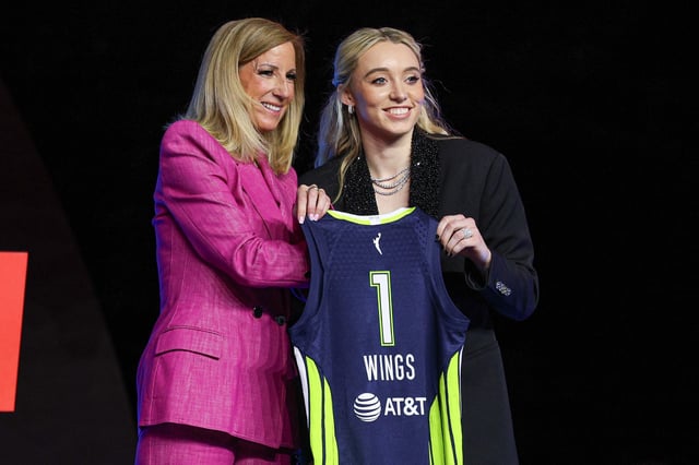 Paige Bueckers poses with WNBA commissioner Cathy Engelbert after being selected with the No. 1 overall pick to the Dallas Wings in the 2025 WNBA draft in New York on April 14, 2025.