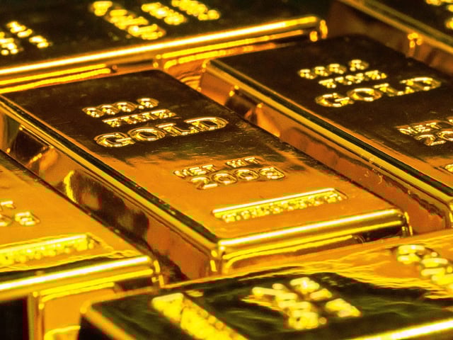 CDCROP: Gold bars stacked close up (Unsplash)