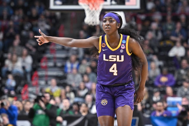Mar 30, 2025; Spokane, WA, USA; LSU Lady Tigers guard Flau'Jae Johnson (4) reacts after play against the UCLA Bruins during the first half of a Elite 8 NCAA Tournament basketball game at Spokane Arena. Mandatory Credit: James Snook-Imagn Images/File Photo
