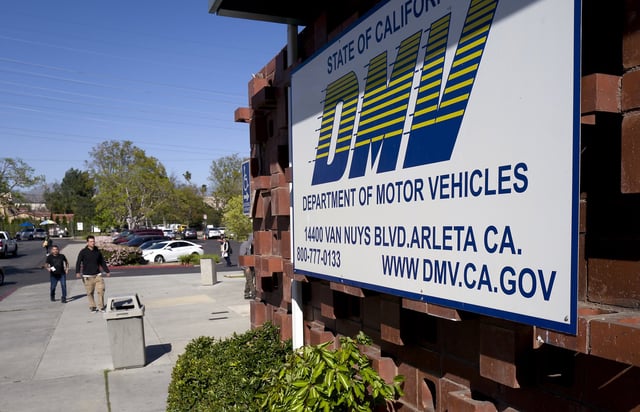 FILE: People approach the California Department of Motor Vehicles office in the Arleta neighborhood of Los Angeles on April 9, 2019. 