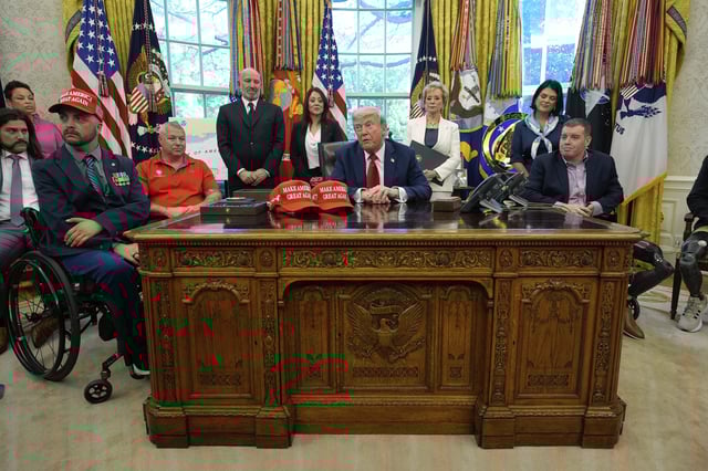 President Donald Trump speaks with reporters after signing executive orders in the Oval Office of the White House, Wednesday, April 23, 2025, in Washington. (AP Photo/Alex Brandon)