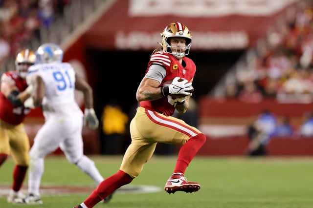 Dec 30, 2024; Santa Clara, California, USA; San Francisco 49ers tight end George Kittle (85) catches the ball during the first quarter against the Detroit Lions at Levi's Stadium. Mandatory Credit: Sergio Estrada-Imagn Images/File Photo