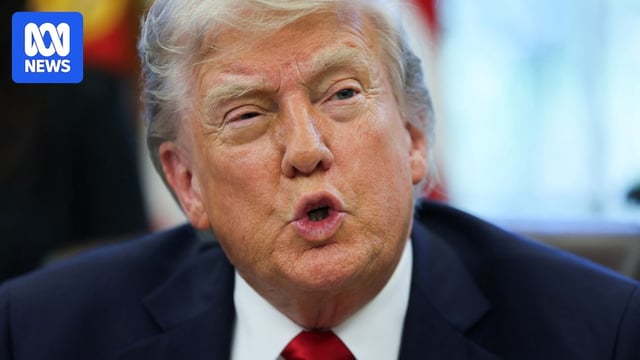 close up of donald trump as he pouts his lips and raises his eyebrows