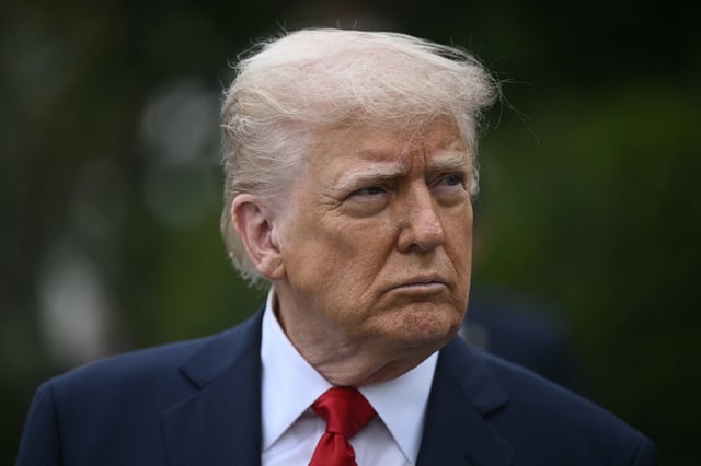 President Donald Trump can be seen looking on as he hosts the annual Easter Egg Roll on the South Lawn of the White House on April 21, 2025, in Washington, D.C. (Photo by Brendan SMIALOWSKI / AFP) (Photo by BRENDAN SMIALOWSKI/AFP via Getty Images)
