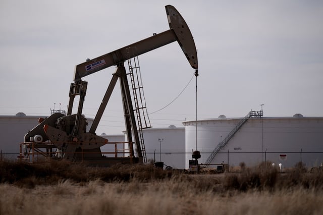 A pump jack operates near a crude oil reserve in the Permian Basin oil field near Midland, Texas, U.S. February 18, 2025.  REUTERS/Eli Hartman
