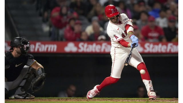 The Angels’ Zach Neto swings at a pitch during the sixth inning of their game against the Pittsburgh Pirates on Wednesday night at Angel Stadium. (AP Photo/Eric Thayer)