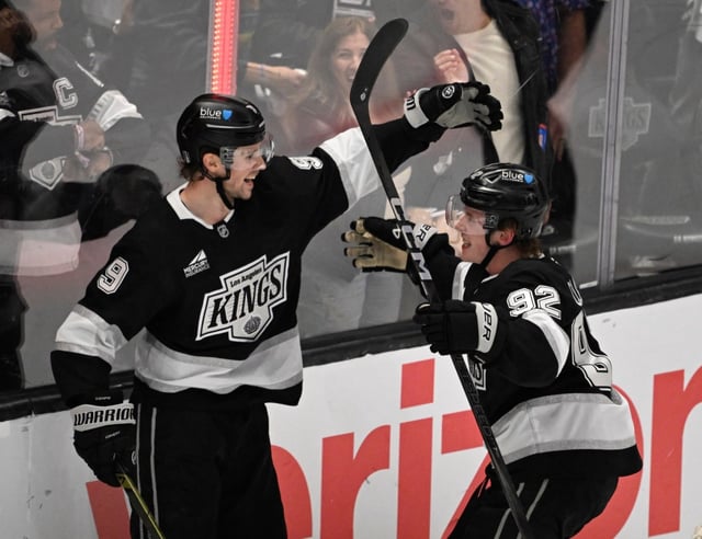 The Kings’ Adrian Kempe, left, celebrates with teammate Brandt Clarke after scoring a goal during the third period of Game 2 of their first-round playoff series against the Edmonton Oilers on Wednesday night at Crypto.com Arena. Kempe had two goals and two assists in a 6-2 win that gives the Kings a 2-0 lead in the best-of-seven series. (Photo by Keith Birmingham, Orange County Register/SCNG)