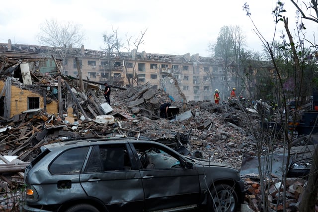 The remains of a building struck by a Russian ballistic missile in the Ukrainian capital on Thursday
