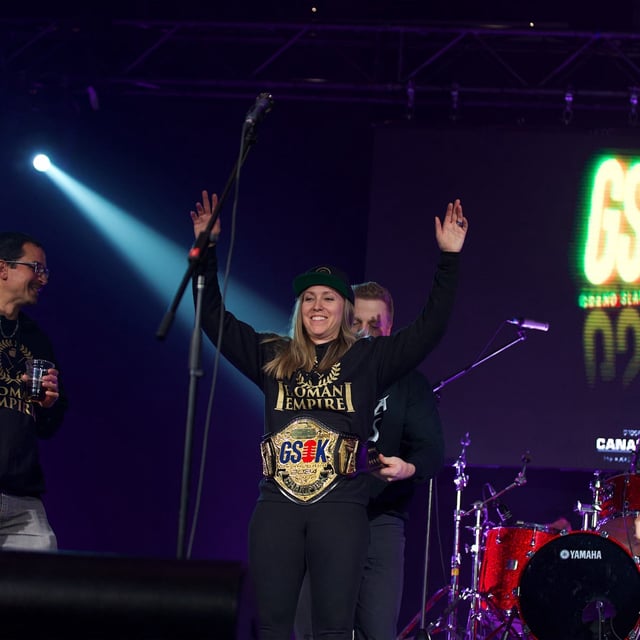 Rachel Homan celebrates winning the championship belt at the Grand Slam of Karaoke during the Grand Slam of Curling in St. John’s, NL on November 30, 2024.