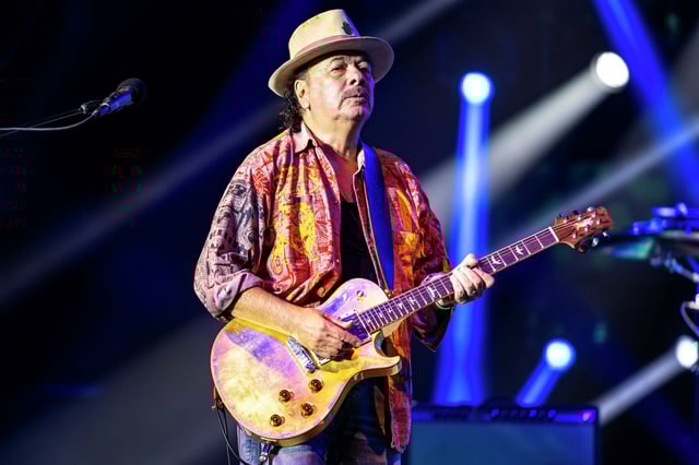 Carlos Santana performs Friday, June 30, 2023, at Ravinia in Highland Park, Ill. Rock musician and iconic guitarist Carlos Santana postponed a Wednesday night performance in Sugar Land after contracting COVID-19. 