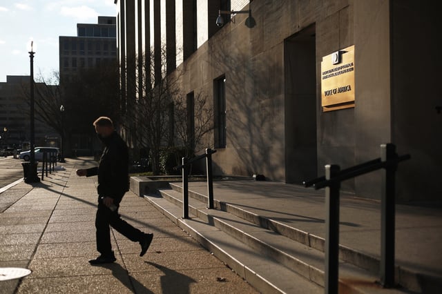 A man comes out of the Voice of America (VOA) building on March 17, 2025 in Washington, DC. President Donald Trump signed an executive order to eliminate the U.S. Agency for Global Media (USAGM), the parent agency of VOA, and put VOA employees on administrative leave. (Photo by Alex Wong/Getty Images)