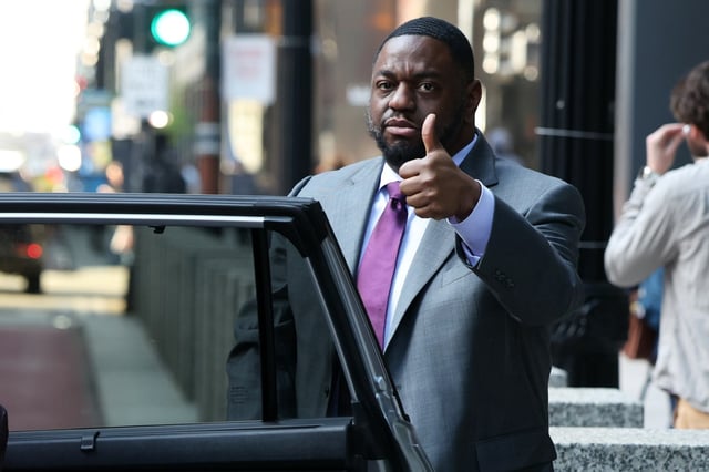 Illinois State Sen. Emil Jones III makes a thumbs-up gesture as he leaves the Dirksen U.S. Courthouse in Chicago on April 23, 2025, after another day of deliberation in his federal bribery trial. (Terrence Antonio James/Chicago Tribune)