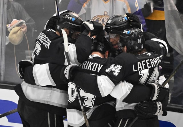 The Kings’ Quinton Byfield (55) celebrates with teammates after scoring a goal during the second period of Game 2 of their first-round playoff series against the Edmonton Oilers on Wednesday, April 23, 2025, at Crypto.com Arena. (Photo by Keith Birmingham, Orange County Register/SCNG)