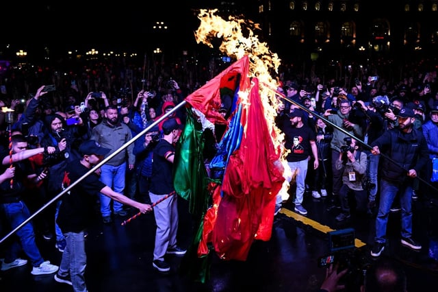 The burning of the flags was later denounced by the prime minister's office