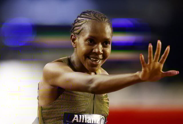 Athletics - Diamond League - Brussels - King Baudouin Stadium, Brussels, Belgium - September 14, 2024 Faith Kipyegon of Kenya celebrates after winning the Women's 1500m final REUTERS/Johanna Geron
