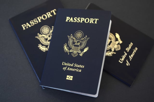 In this May 9, 2017, file photo, U.S. passports lie on a table in Dallas. (AP Photo/Benny Snyder, File)
