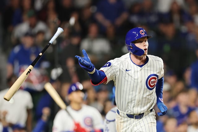 CHICAGO, ILLINOIS - APRIL 22: Pete Crow-Armstrong #4 of the Chicago Cubs celebrates a two-run home run off Dustin May #85 of the Los Angeles Dodgers (not pictured) during the fifth inning at Wrigley Field on April 22, 2025 in Chicago, Illinois.
