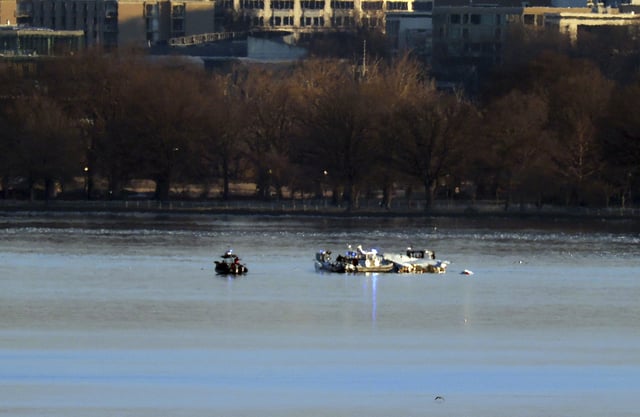 File Photo: Search and rescue crews search for debris after an American Airlines passenger jet had crashed into a military helicopter while landing in Washington, D.C., on January 30, 2025. The crash was one deadly aviation accident this year.