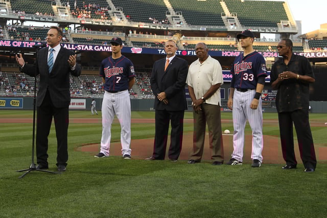Former Minnesota Twin Paul Molitor speaks to the crowd about the 2014 All-Star Game with Joe Mauer #7, Bert Blyleven, Tony Oliva, Justin Morneau #33 and Rod Carew prior to the game against the Seattle Mariners on August 29, 2012 at Target Field in Minneapolis.