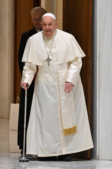 Pope Francis arrives for a meeting with the Catholic Union of Teachers, Managers, Educators, Trainers (UCIIM) - the Italian Association of Catholic Teachers (AIMC) - the Association of Parents of Catholic Schools (AGESC), at Paul-VI hall in the Vatican on January 4, 2025.