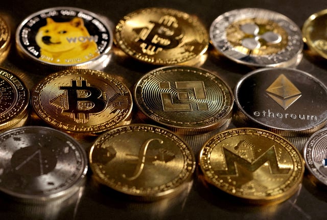 Representations of cryptocurrencies are seen in this illustration, August 10, 2022. REUTERS/Dado Ruvic/Illustration/File Photo
