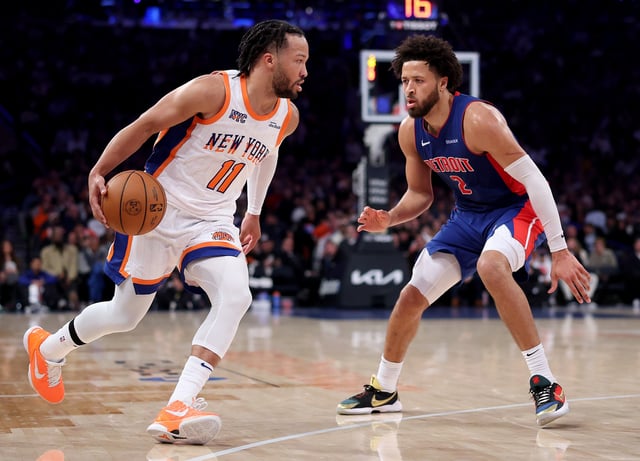 Jalen Brunson #11 of the New York Knicks heads for the net as Cade Cunningham #2 of the Detroit Pistons defends in the second half at Madison Square Garden on December 07, 2024 in New York City. The Detroit Pistons defeated the New York Knicks 120-111.