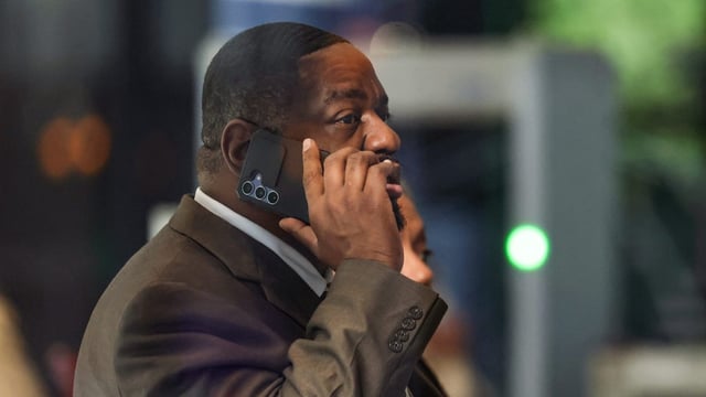 State Sen. Emil Jones III waits in the lobby after attending his bribery trial at the Dirksen U.S. Courthouse on April 16, 2025, in Chicago. (John J. Kim/Chicago Tribune)