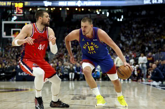Nikola Jokic #15 of the Denver Nuggets drives the ball against Ivica Zubac #40 of the LA Clippers in Game One of the Western Conference First Round NBA Playoffs at Ball Arena on April 19, 2025 in Denver, Colorado.