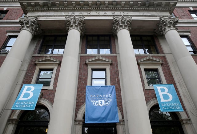 In this 2015 photo, banners hang from a building at Barnard College in New York.