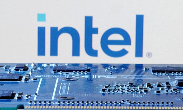 Intel logo is seen near computer motherboard in this illustration taken January 8, 2024. REUTERS/Dado Ruvic/Illustration/File Photo