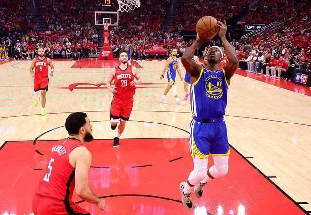 Jimmy Butler III #10 of the Golden State Warriors attempts a shot against the Houston Rockets in Game One of the Western Conference First Round NBA Playoffs at Toyota Center on April 20, 2025 in Houston, Texas.