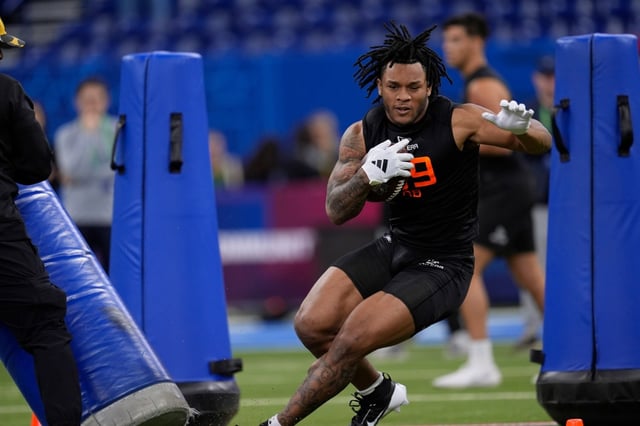 North Carolina running back Omarion Hampton runs a drill at the NFL football scouting combine in Indianapolis, Saturday, March 1, 2025. (AP Photo/George Walker IV)