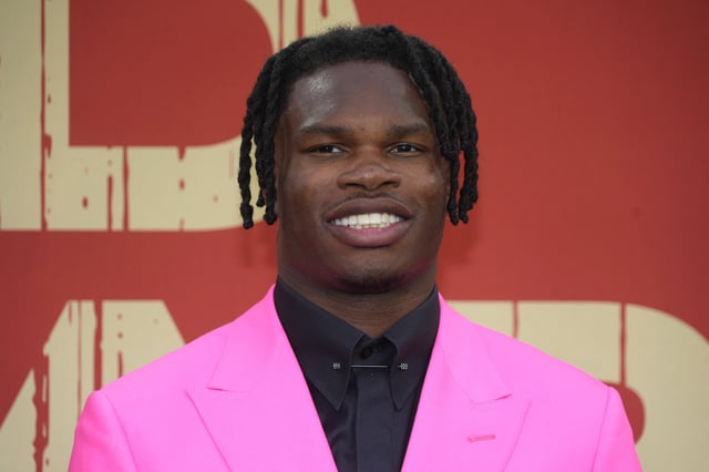 Apr 24, 2025; Green Bay, WI, USA; Colorado Buffaloes wide receiver Travis Hunter on the red carpet before the 2025 NFL Draft at Lambeau Field. Mandatory Credit: Kirby Lee-Imagn Images