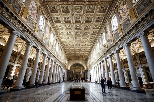 People walk inside the Basilica of Santa Maria Maggiore (Saint Mary Major) where Pope Francis has decided to be buried in Rome, Italy, December 21, 2023. REUTERS/Guglielmo Mangiapane