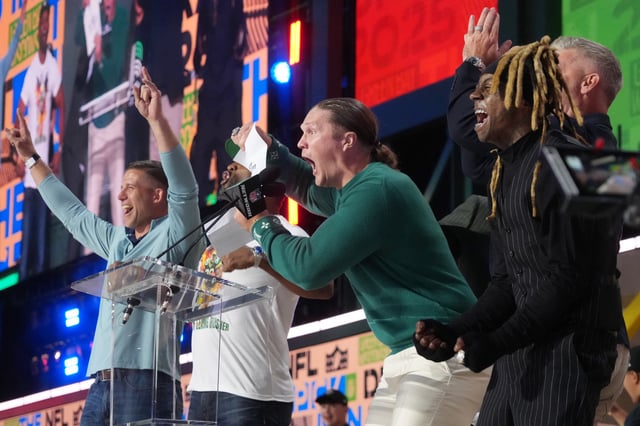 Apr 24, 2025; Green Bay, WI, USA; Former Green Bays Packers player Clay Matthews speaks before the first round of the 2025 NFL Draft at Lambeau Field. Mandatory Credit: Kirby Lee-Imagn Images