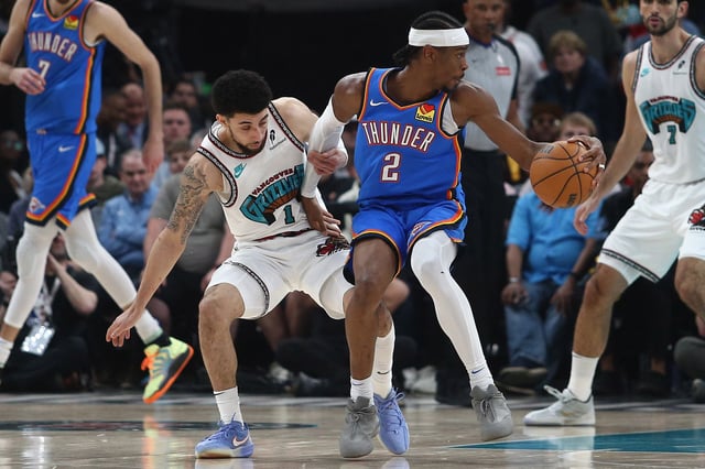 Apr 24, 2025; Memphis, Tennessee, USA; Oklahoma City Thunder guard Shai Gilgeous-Alexander (2) spins toward the basket during the second quarter during game three for the first round of the 2024 NBA Playoffs at FedExForum. Mandatory Credit: Petre Thomas-Imagn Images