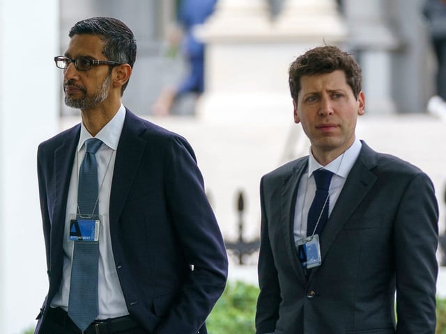 Alphabet's Sundar Pichai and OpenAI's Sam Altman walk to meeting at the White House in Washington DC.