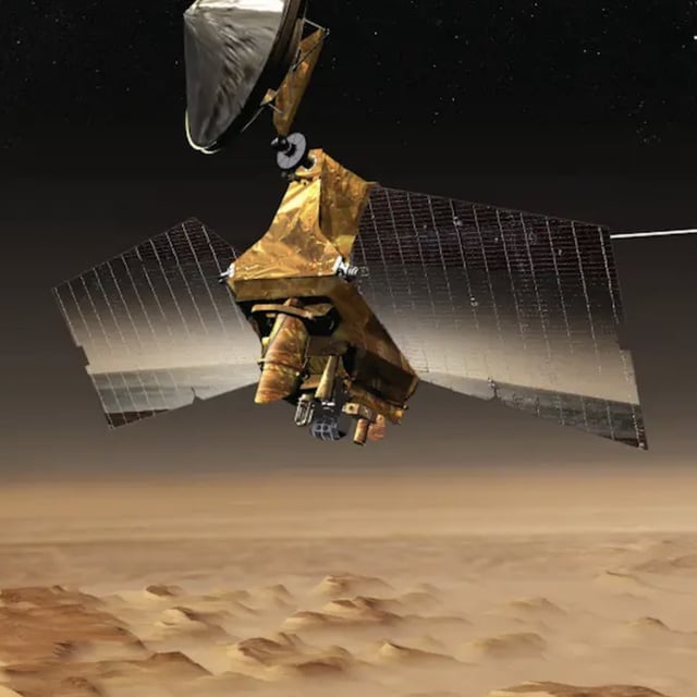 An artist's impression of the Mars Reconnaissance Orbiter flying above Mars.