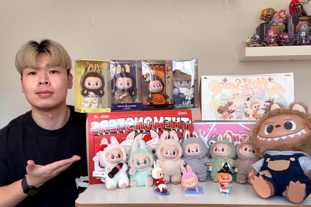 Australian collector Lawrence Yu shows off his collection of Labubus.