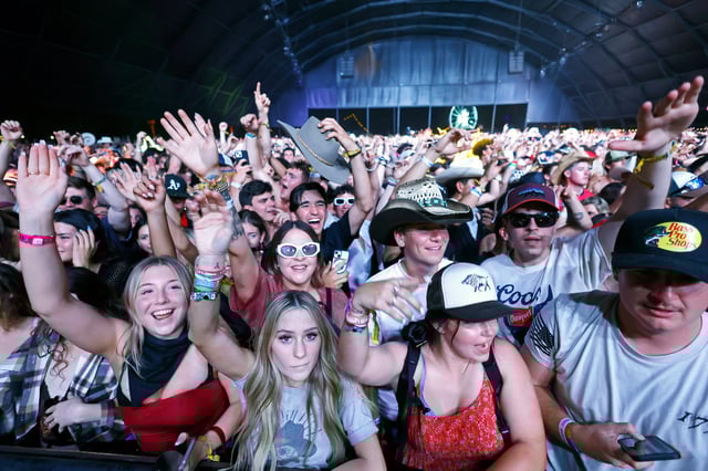 INDIO, CALIFORNIA - APRIL 27: (FOR EDITORIAL USE ONLY) Festivalgoers watch Diplo perform at the Palomino Stage during the 2024 Stagecoach Festival at Empire Polo Club on April 27, 2024 in Indio, California. (Photo by Frazer Harrison/Getty Images for Stagecoach)