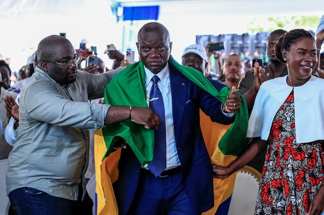 Gabon's junta chief Brice Oligui Nguema (2nd R) won the presidency with 94.85 percent of the vote, according to final results