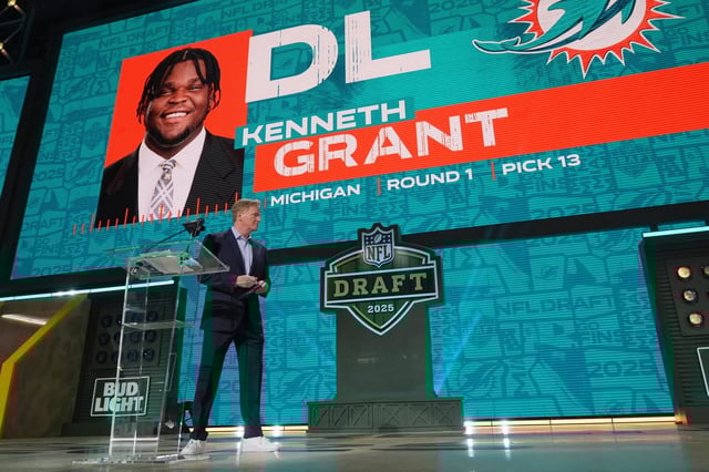 NFL Commissioner Roger Goodell announces Kenneth Grant being chosen by the Miami Dolphins with the 13th overall pick during the first round of the NFL football draft, Thursday, April 24, 2025, in Green Bay, Wis. (AP Photo/Jeff Roberson)