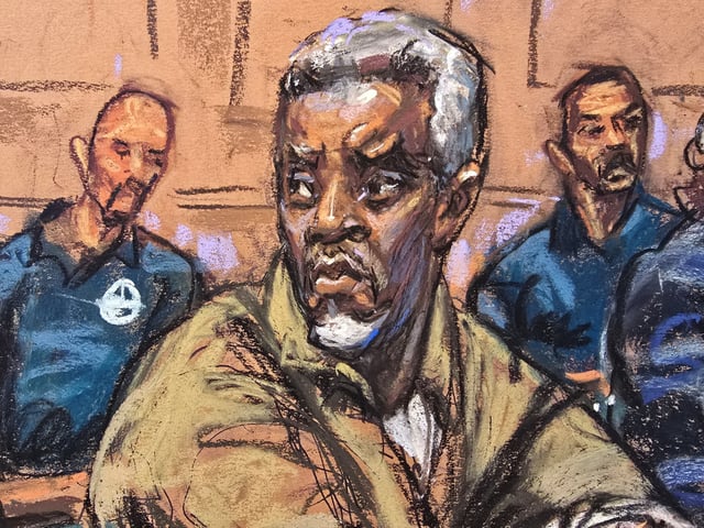 Sean "Diddy" Combs sits with members of his defense team for a conference ahead of his trial next month on sex trafficking charges, in New York, U.S., April 18, 2025, in this courtroom sketch. REUTERS/Jane Rosenberg