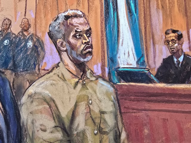 Sean "Diddy" Combs stands as he is arraigned on a superseding indictment ahead of his May trial on sex trafficking charges, in New York, U.S., March 14, 2025, in this courtroom sketch. REUTERS/Jane Rosenberg/File Photo