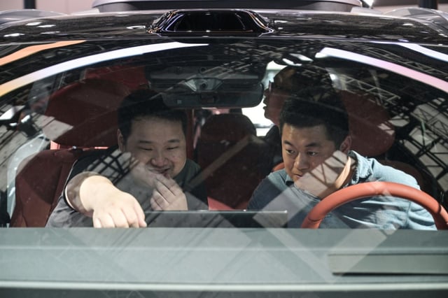 More than a million EREVs were sold in China last year, with models on display at the Auto Shanghai industry show