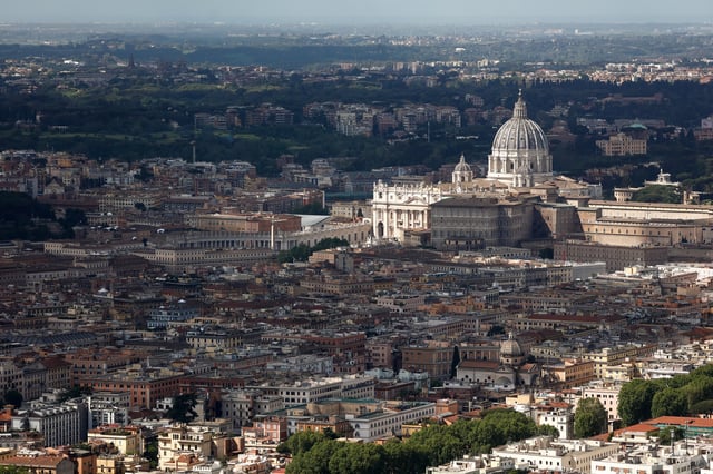 An aerial view from a Carabinieri helicopter shows St. Peter's Basilica at the Vatican, where Pope Francis lies in state, as seen from Rome, Italy April 25, 2025. REUTERS/Vincenzo Livieri