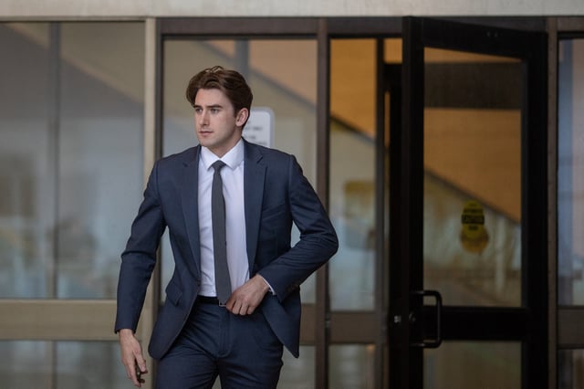 Michael McLeod, one of five teammates on Canada's 2018 gold medal-winning world junior hockey team charged with sexually assaulting a woman in a hotel room, leaves the Superior Court of Justice in London, Ontario, Canada April 22, 2025.  REUTERS/Brett Gundlock/File Photo